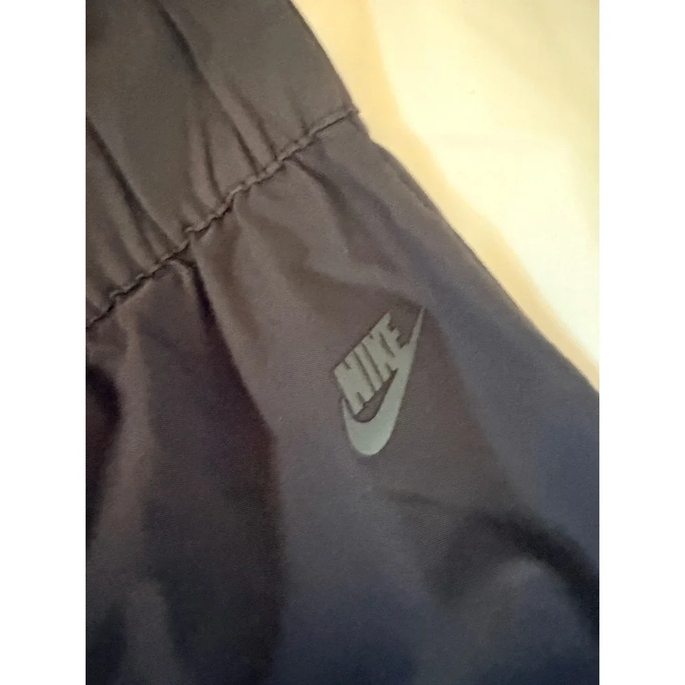 Nike Sportswear Tech Pack Stirrup Pants Black Tapered Knee Vent Women's Medium